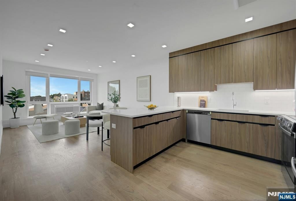 Property Photo:  8404 4th Avenue 410  NJ 07047 