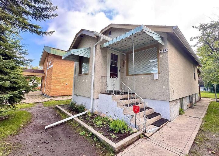 Property Photo: 230 8A Street NE AB T2E 4J1