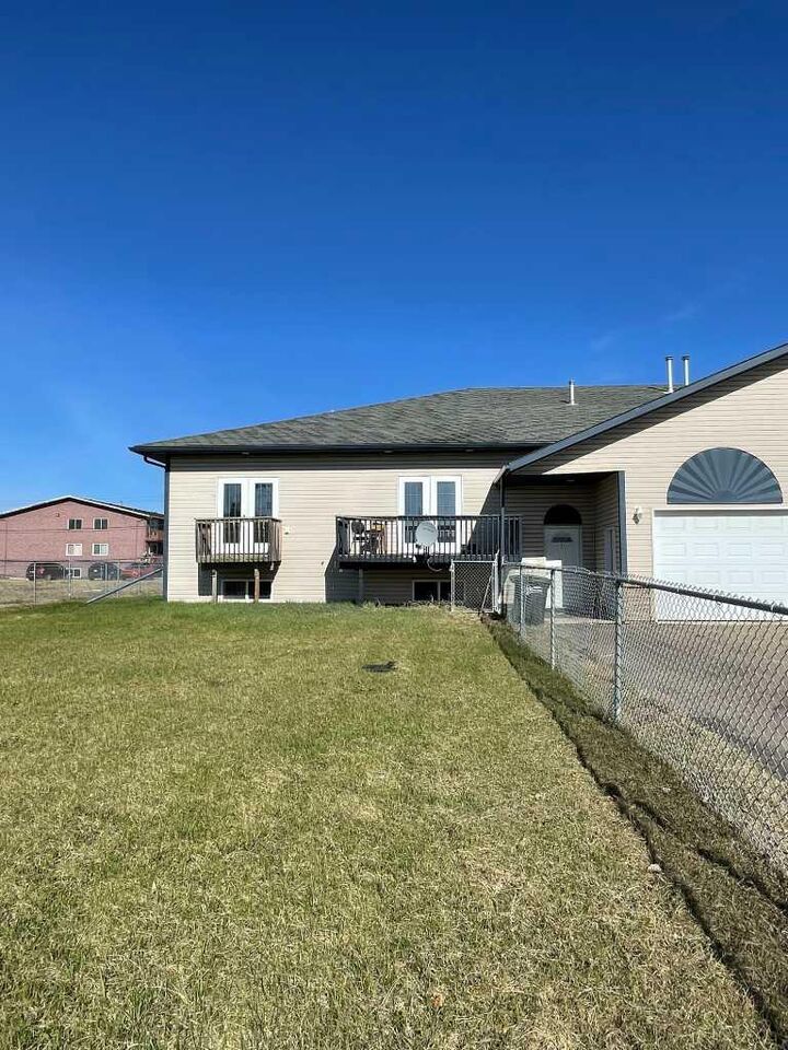 Property Photo: 10310 98 Street E Unit B AB T0H 1Z0