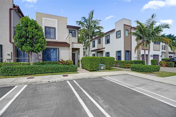 Property Photo:  391 NE 208th Ter 391  FL 33179 