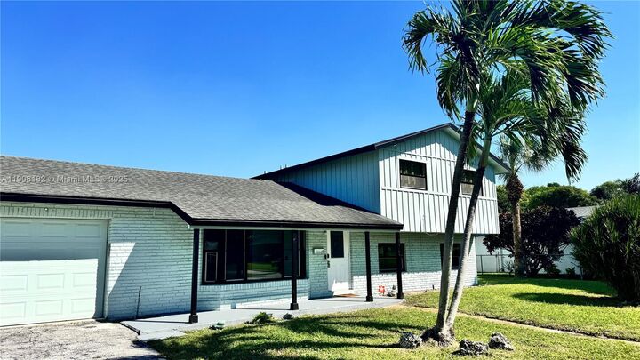 Property Photo:  1659 40th St  FL 33407 