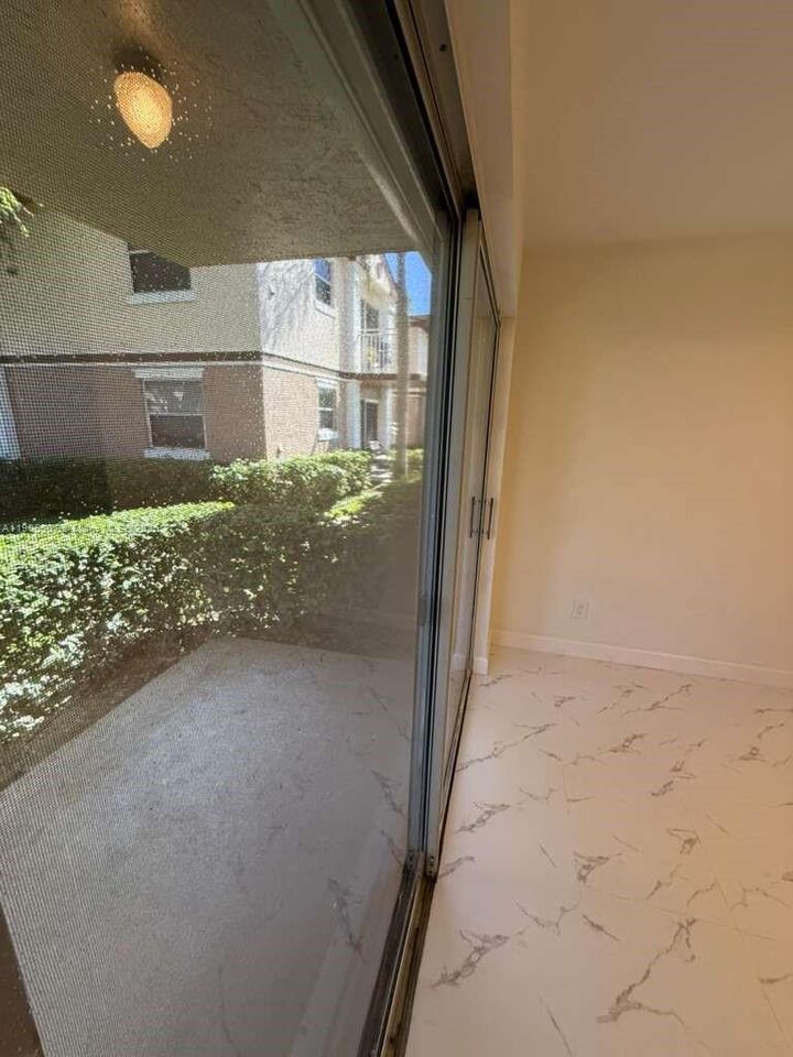 Property Photo:  11250 SW 13th St 104  FL 33025 