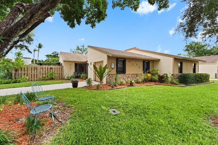 Property Photo: 901 NW 26th Ave FL 33445