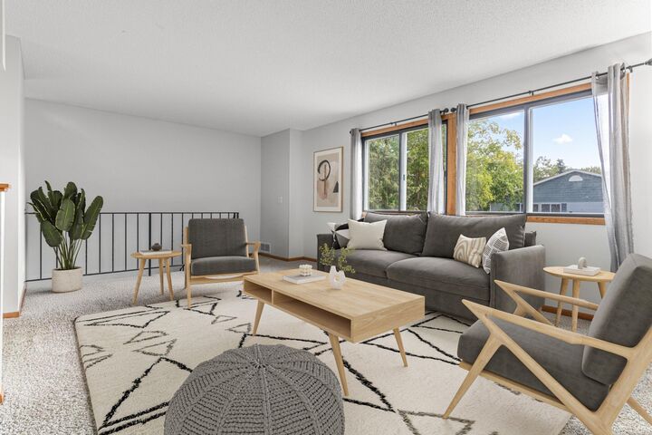 Property Photo:  7610 15th Street Lane N 907  MN 55128 