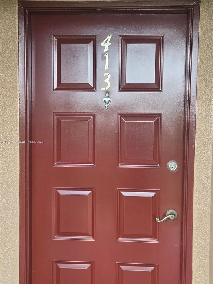 Property Photo: 300 SW 130th Ter 413B FL 33027