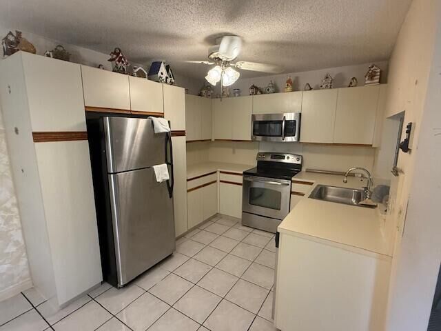 Property Photo:  7690 Tahiti Lane 202  FL 33467 