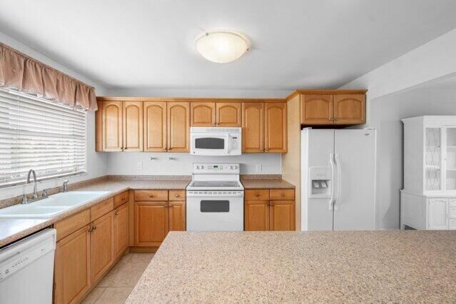 Property Photo:  2016 S Federal Highway E408  FL 33435 