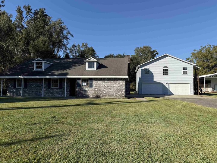 Property Photo:  215 Gilmer  TX 77611 