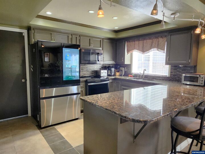 Property Photo:  1387 Windsong Ct NW  OR 97304 