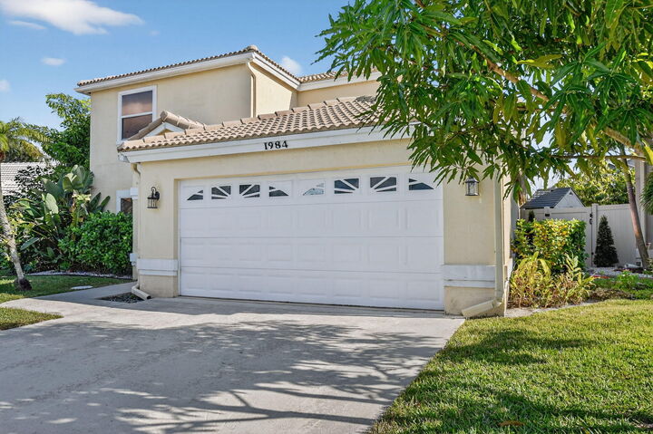 Property Photo: 1984 White Coral Way FL 33414