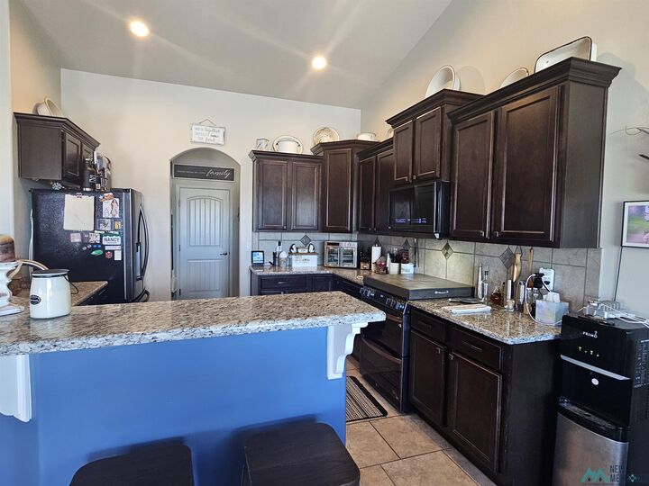 Property Photo:  823 Calamity Jane Drive  NM 88220-3068 