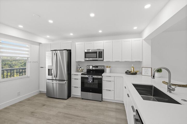 Property Photo:  12500 SW 5th Ct 410M  FL 33027 