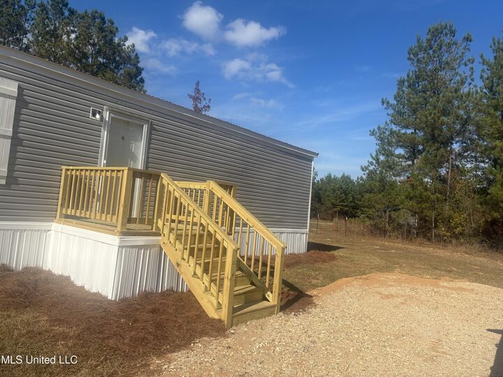 Property Photo:  7158 B N Hwy 57  MS 39452 