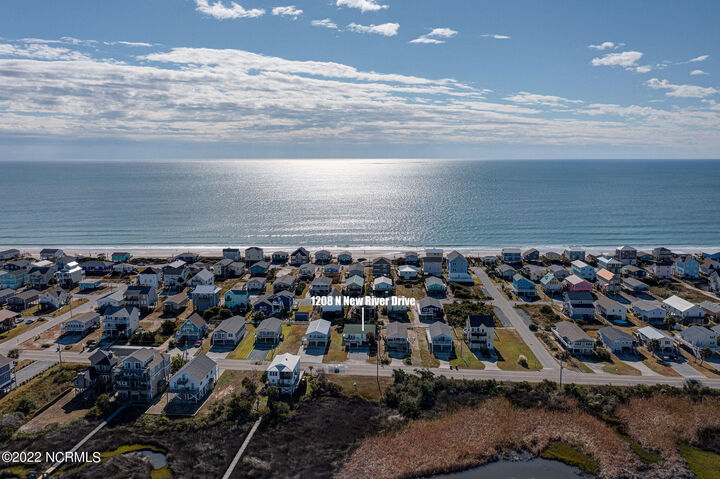 Property Photo:  1208 N New River Drive  NC 28445 