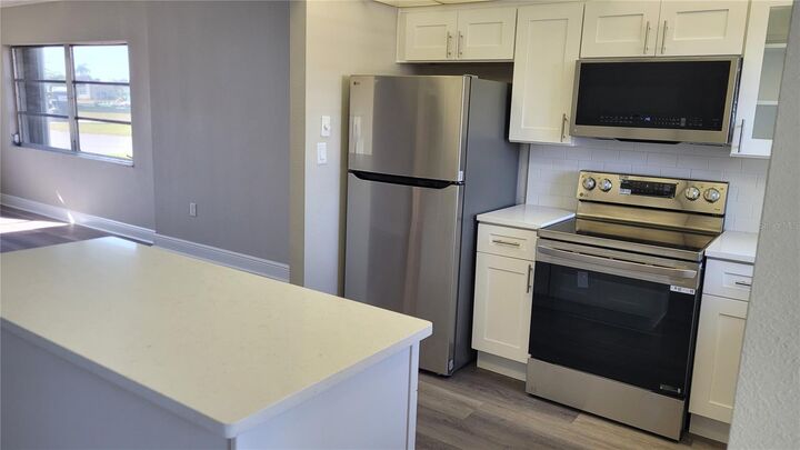 Property Photo:  4650 Cove Circle 111  FL 33708 