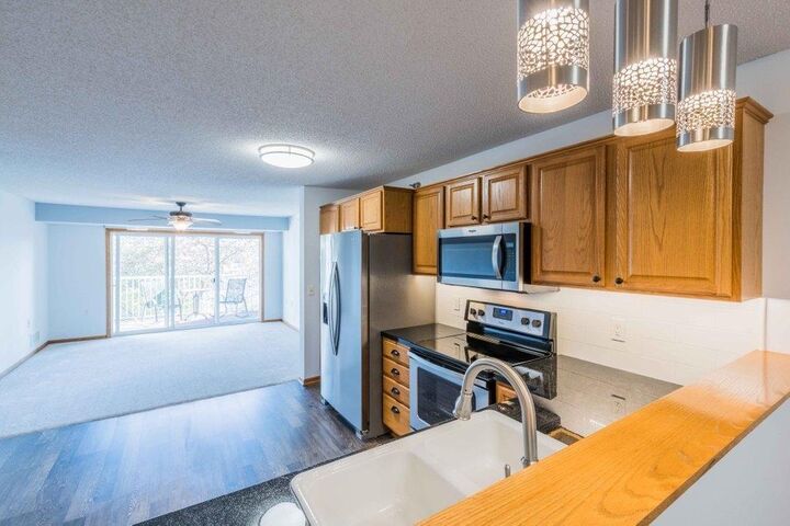 Property Photo:  16154 Main Avenue SE 212  MN 55372 