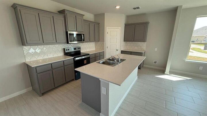 Property Photo:  105 Seabiscuit Court  TX 76049 