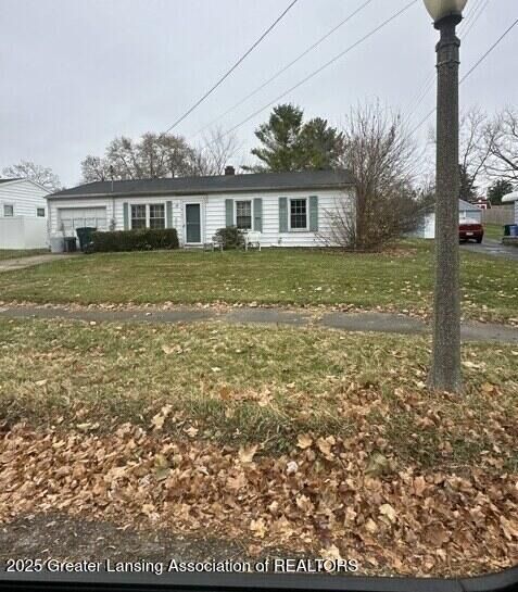 Property Photo:  4731 Palmer Street  MI 48910 