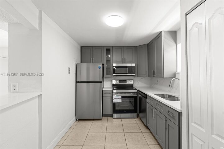 Property Photo:  4215 N University Dr. 203  FL 33351 