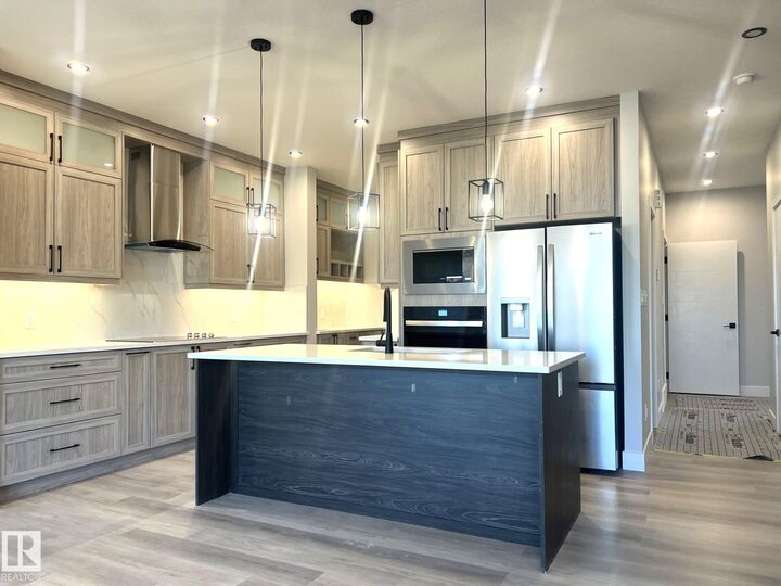 Property Photo:  61 Wynn Road  AB T8L 1P3 