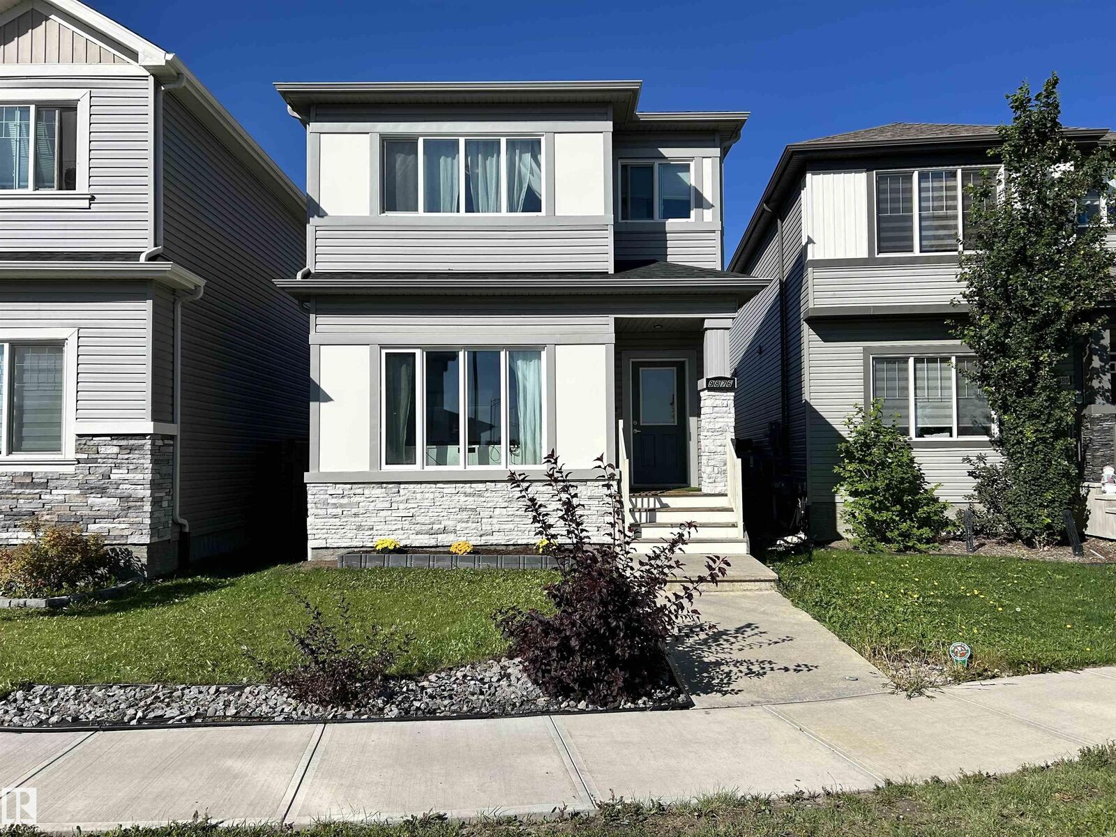 Property Photo:  9876 206 Street NW  AB T5T 7L5 