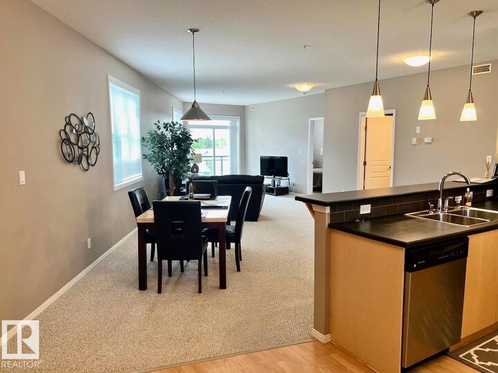 Property Photo: 9940 Sherridon Drive 400 AB T8L 4C9