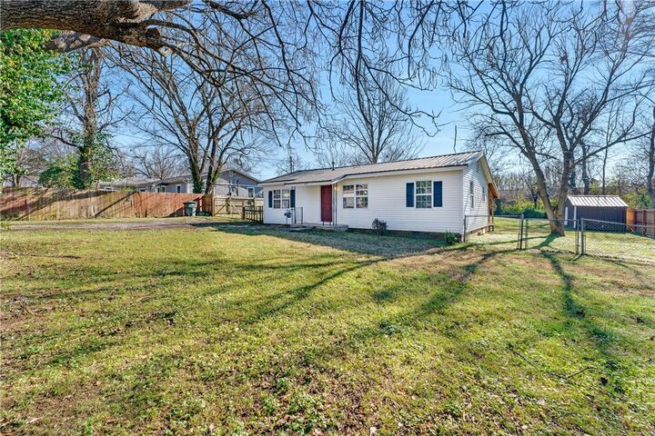Property Photo:  637 E McClinton Street  AR 72701 