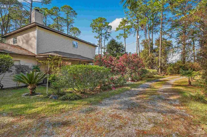 Property Photo:  7985 Mobile Hwy  FL 32526 