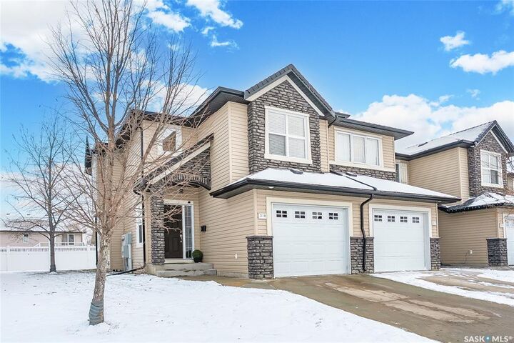 Property Photo:  410 Ledingham Way 318  SK S7V 0C4 