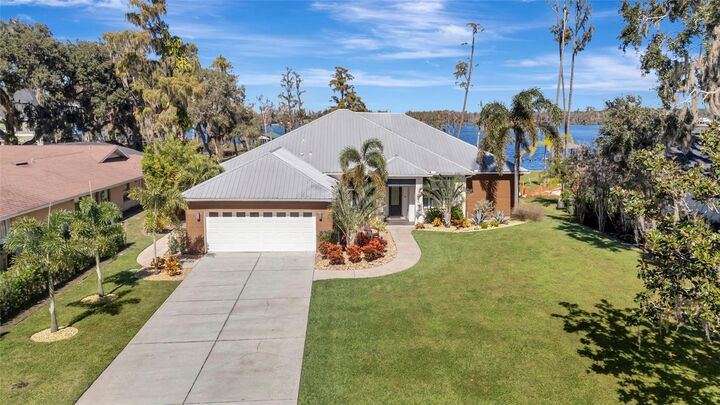 Property Photo: 10303 Thompson Place FL 34711