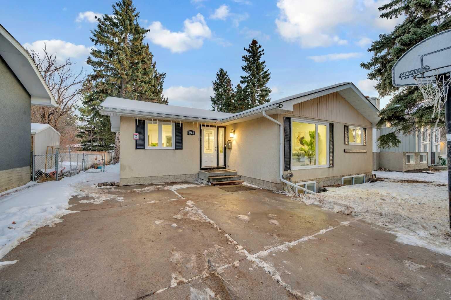 Property Photo:  5868 Dalcastle Drive NW  AB T3A 2B6 