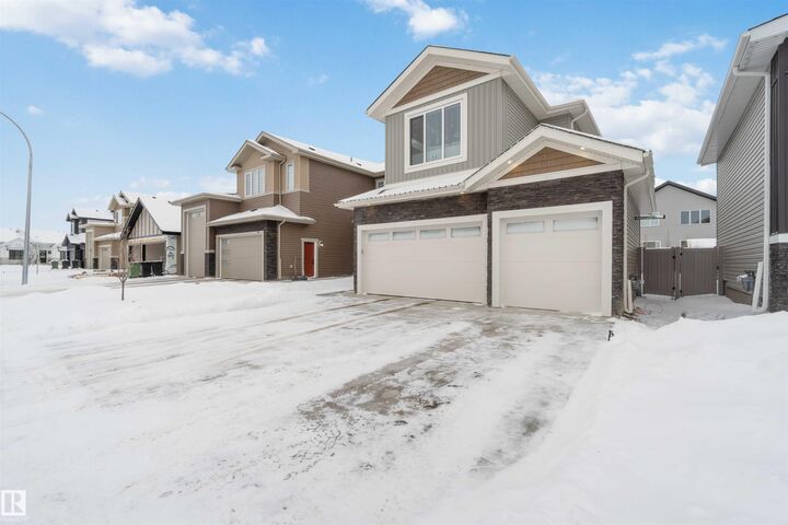 Property Photo:  53 Deer Meadow Crescent  AB T8L 1Y4 