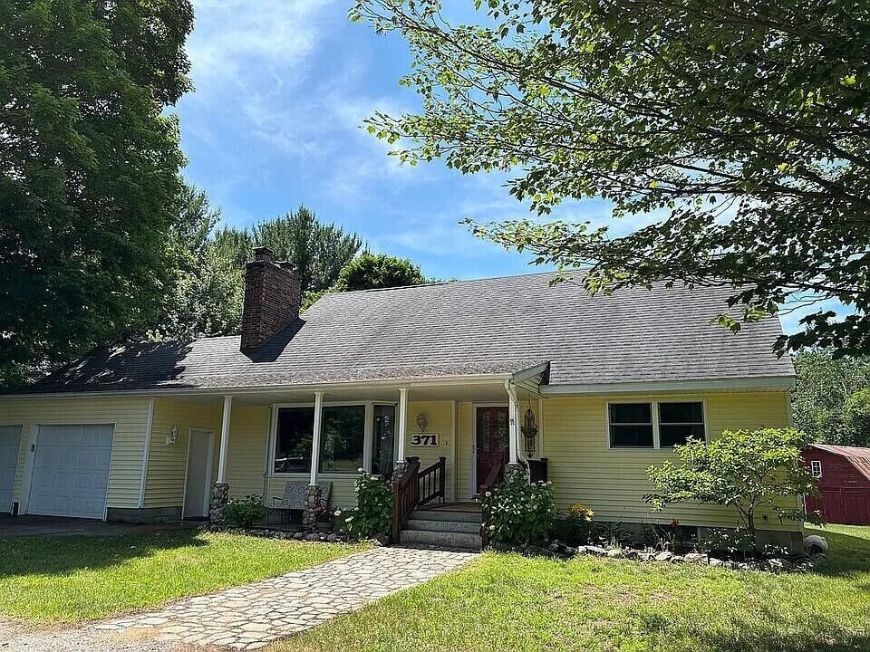 Property Photo:  371 N Stiles Road  MI 49431 