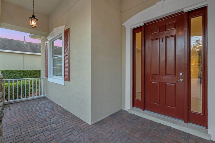 Property Photo: 7271 E Village Square FL 32966