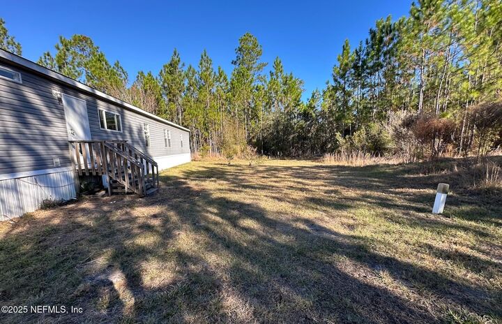 Property Photo:  8311 County Road 217  FL 32234 