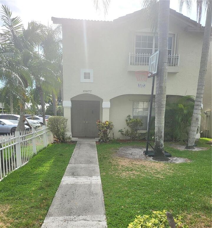 Property Photo:  10877 NW 8th St  FL 33026 