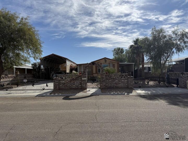 Property Photo:  12635 E 44 Dr  AZ 85367 