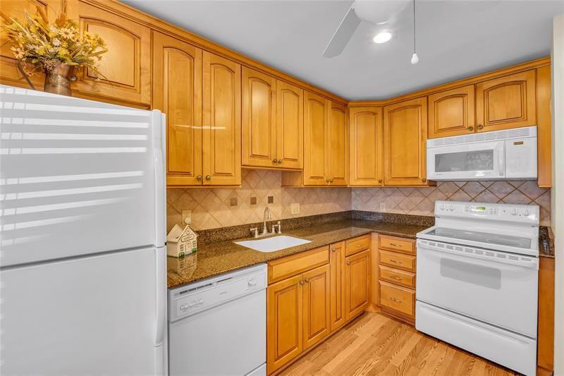 Property Photo:  21656 Juego Cir 23-K  FL 33433 