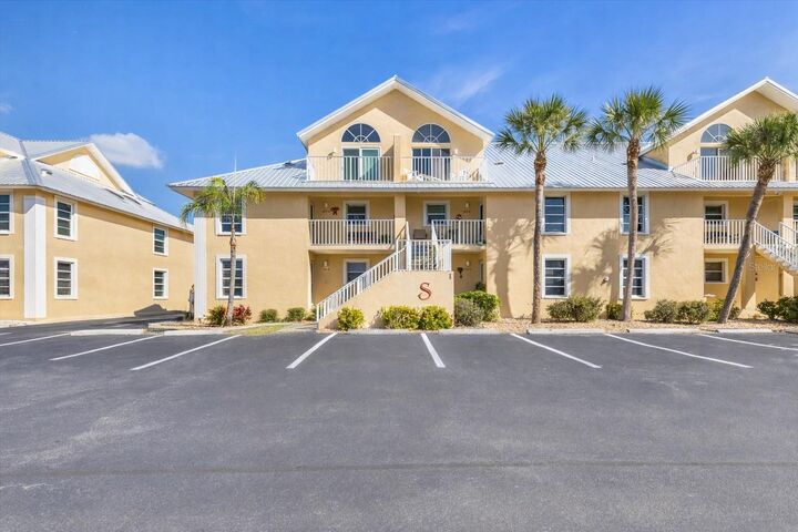 Property Photo:  6610 Gasparilla Pines Boulevard 104  FL 34224 