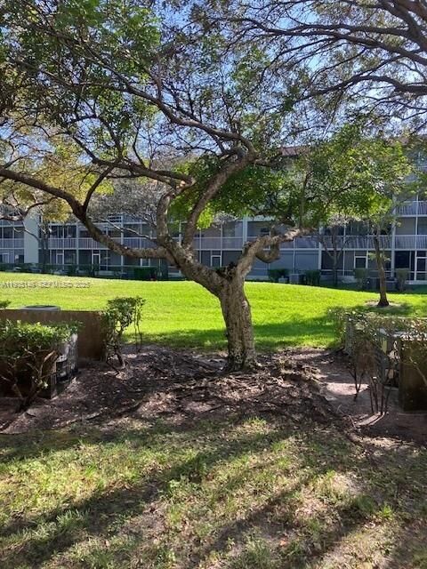 Property Photo:  801 SW 133rd Ter 115K  FL 33027 