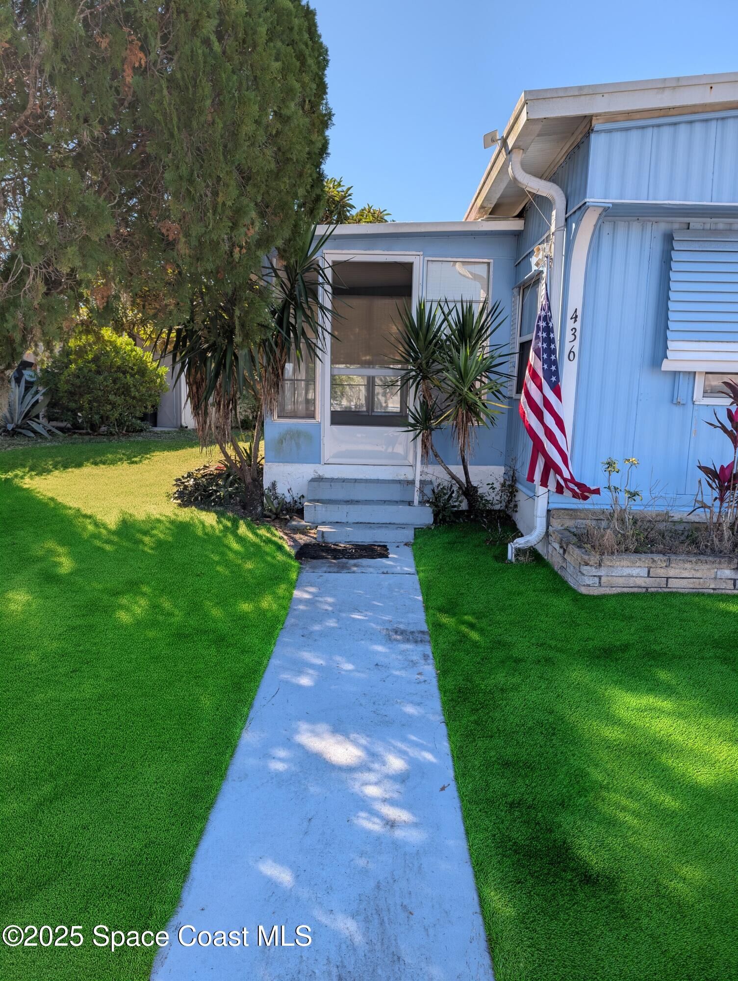 Property Photo:  436 NE Holiday Park Boulevard NE  FL 32907 