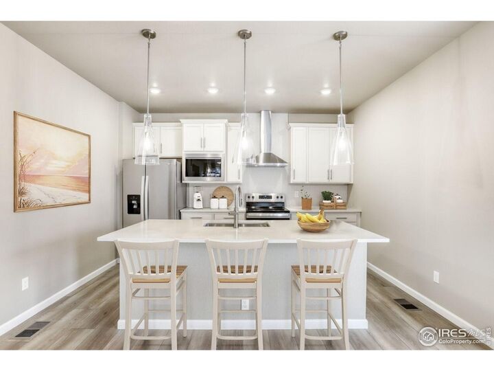 Property Photo:  640 Noola St  CO 80550 