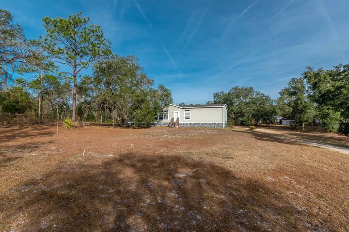Property Photo:  10351 NE 90th Street  FL 32621 