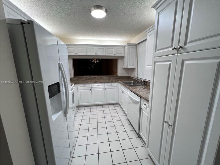 Property Photo:  10426 E Clairmont Cir 212  FL 33321 