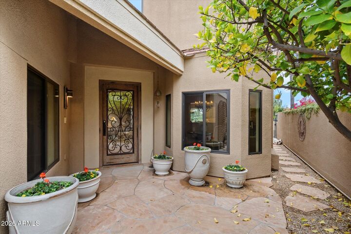 Property Photo: 7740 E Gainey Ranch Road 27 AZ 85258