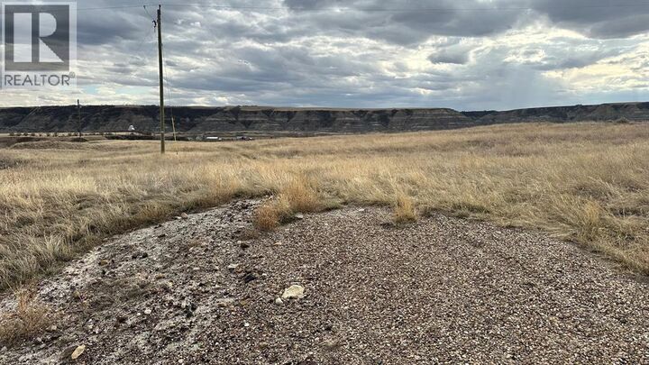 Property Photo:  838 North Dinosaur Trail  AB T0J 0Y1 