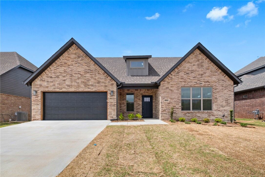 Property Photo:  4802 SW Scarlet Oak Street  AR 72713 