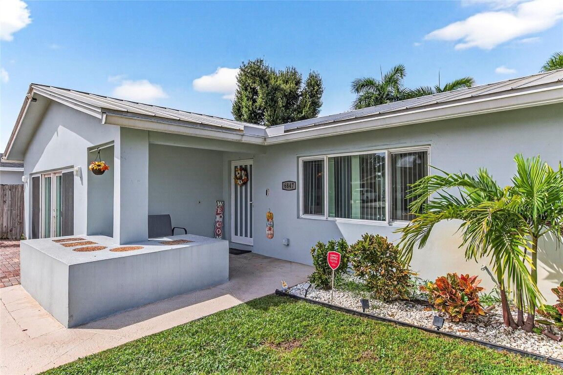 Property Photo:  6847 NW 27th Way  FL 33309 