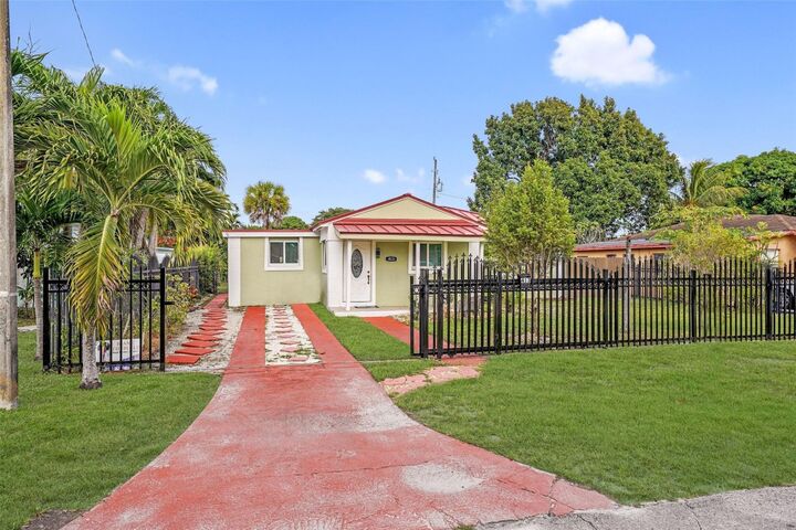 Property Photo:  413 NW 100th Terrace  FL 33150 