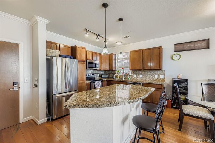 Property Photo:  13456 Via Varra 225  CO 80020 